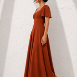Robe grande taille terracotta de profil