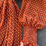 Robe rétro terracotta à pois manche