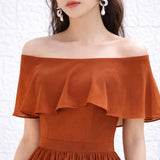 Robe témoin terracotta épaules dénudées