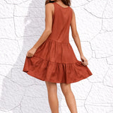 Robe terracotta dentelle et pompons